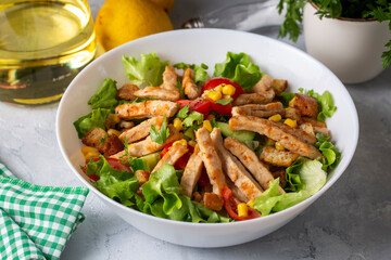 Wall Mural - Caesar salad with grilled chicken