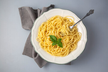 Wall Mural - Buttered spaghetti pasta served looks delicious - Plain spaghett on dish - cooked spaghetti