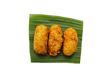 Wall Mural - Deep-fried banana rolls with unripe rice grain