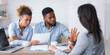 © Prostock-studio - Angry afro couple criticizing and rejecting insurance broker's advice sitting at her office. Selective focus