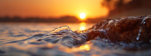 Wall Mural -  The sun sets over a rock-dotted body of water