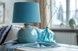 © kardaska - Elegant blue lamp in modern room