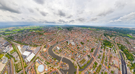 Wall Mural - Haarlem, Netherlands. Panorama of the city in summer in cloudy weather. Aerial view