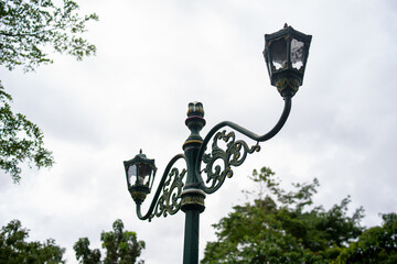 Typical Street Lamp in Yogyakarta and vintage lamp. Retro style green street lamp post on Yogyakarta street