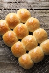 Wall Mural - Delicious dough balls on wooden table, top view