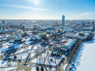 Winter Yekaterinburg and Temple on Blood in beautiful cloudy sunset. Aerial view of Yekaterinburg, Russia. Translation of the text on the temple: Honest to the Lord is the death of His saints.