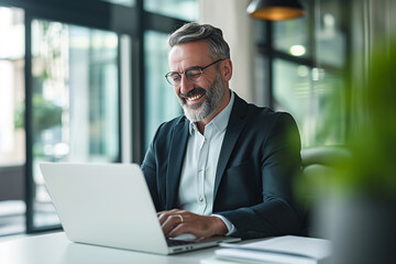 businessman working on laptop for video conference meeting joyful and happy photo