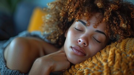 Canvas Print - Woman with depression, lying on the couch, eyes closed, holding a pillow 
