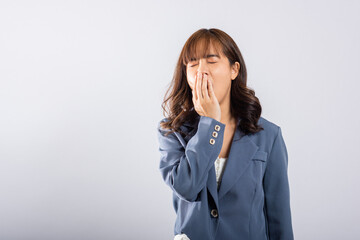 portrait asian beautiful young business woman emotions tired and sleepy her yawning covering mouth o