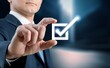 © BillionPhotos.com - Business man using digital correct sign for document approve