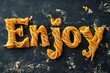 © Minerva Studio - Enjoy - word enjoy written with raw pasta on dark stone background