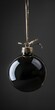 © Vlad - Black Christmas Ornament. Elegant Bauble Hanging in Low Key Holiday Decoration