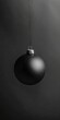 © Vlad - Black Christmas Ornament. Elegant Bauble Holiday Decoration on Dark Background