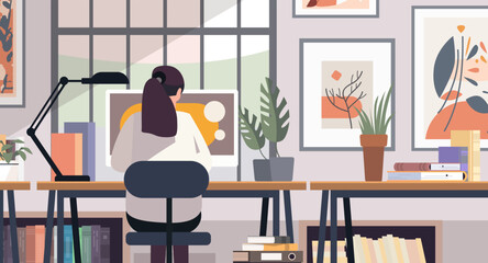 Wall Mural - Woman working at desk home office modern workspace with plants books and art on walls