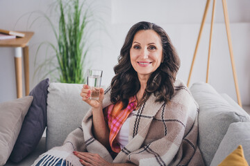 Wall Mural - Photo of adorable sweet lady wear plaid shirt smiling enjoying water indoors room home house