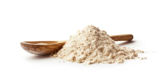 Poster - A pile of wheat flour next to a wooden spoon on a white background showcasing a clear copy space image