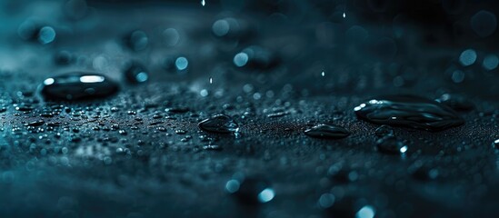 Poster - Water droplets on a dark surface emphasizing the concept Captures a copy space image