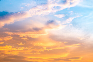 Wall Mural - Beautiful , luxury soft gradient orange gold clouds and sunlight on the blue sky perfect for the background, take in everning,Twilight, Large size, high definition landscape photo