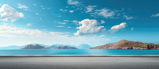 Poster - Scenic blue sky over an island landscape sea aside with an asphalt highway and copy space image