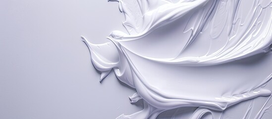 Poster - Skin care cream in a smooth texture spread on a white background for a copy space image