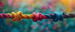 © DonChanu - Intertwined Colorful Ropes on Bokeh Background.