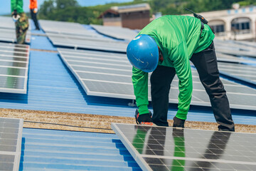 Wall Mural - Worker Technicians are working to construct solar panels system on roof. Installing solar photovoltaic panel system. Men technicians walking on roof structure to check photovoltaic solar modules.