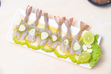 Shrimp in fish sauce on the white background.