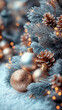 © Nando Vidal - Close-up of a Christmas tree branch over snow ornamented with white and golden balls and pine cones