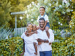 © peopleimages.com - Black family, portrait and happy in garden with love for bonding together, affection and care outdoor. People, parents and kids in park for summer holiday, security and support in natural environment