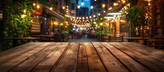 Poster - Perfect for showcasing products or ads on a wooden table in a bustling restaurant at night this vibrant setting offers an appealing copy space image