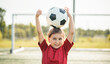 © Louis-Paul Photo - child girl with soccer ball on court on summer season