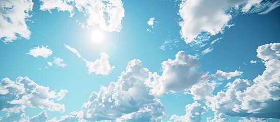 Sticker - Sunny blue sky with fluffy white clouds creating a textured background with room for text in the open air. Copy space image. Place for adding text and design