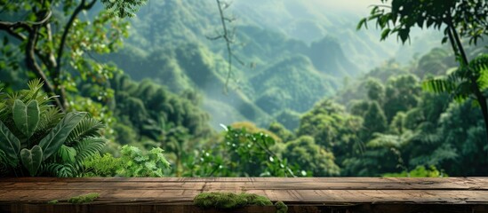 Poster - Wooden table with mountain and lush green backdrop offering room for product advertising Scenic forest creates ideal copy space image