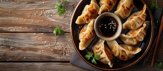 Poster - An image featuring soy sauce accompanied by gyoza or dumplings with a focus on a particular area and an unoccupied space for text. Copy space image. Place for adding text and design