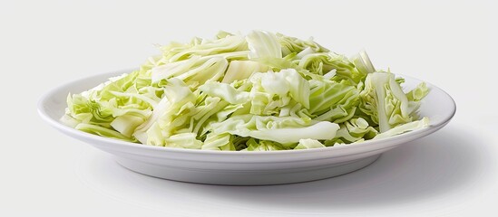 Sticker - Close up of sliced cabbage on a white plate with an isolated white background for a copy space image Showing fresh vegetable prepared salad and the benefits of this healthy food