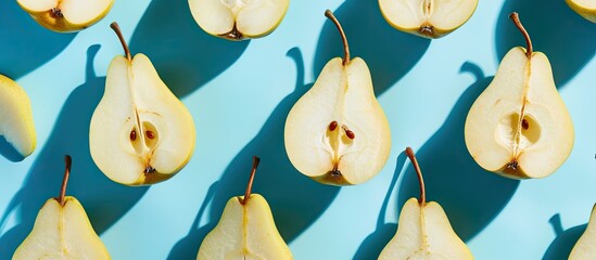 Poster - Minimal style creative layout featuring raw sliced pears on a blue backdrop with a shadow embodying a healthy food ingredient concept viewed from the top with copy space image