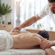 © ImagineThatStudios - Osteopath treating a patient