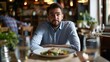 © Adi - Man sitting at restaurant table, plate of meal in front of him, bad food taste, unhappy displeased customer, dissatisfied