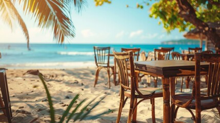 Ocean or sea sand beach restaurant or cafe with tables and chairs. Tropical island summer holiday or vacation resort food