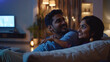 © Cedric - young indian couple watching tv