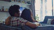 © Cedric - young indian couple watching tv