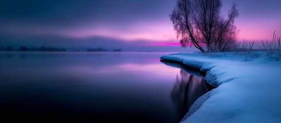 pink sunrise over the winter lake. 