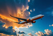 © Galeno - airplane flying blue sky large orange clouds suitable travel tourism promotions