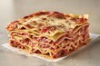 © igor - Layered lasagna with melted cheese and meat sauce