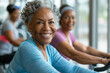 © zphoto83 - Elderly women engaging in group exercise at modern fitness center during afternoon hours