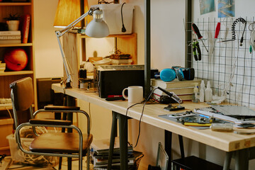 Work desk of university technician with tool kit to repair computers or other types of electronic devices