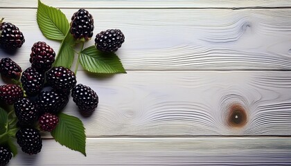 Wall Mural -  blackberries on white wooden table seen from above