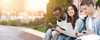 © Prostock-studio - Happy Teens International Students Studying Together Outdoors, Enjoying University Life, Selective Focus On Asian Girl