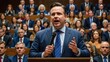 © Nathan - A confident male politician speaks passionately at a packed assembly, addressing an engaged audience in formal attire.