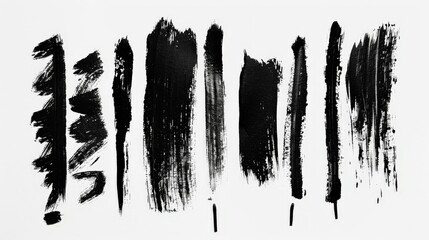 Aufkleber - This image features various bold, black brushstrokes on a plain white background, creating a striking and abstract visual effect that highlights texture and contrast.